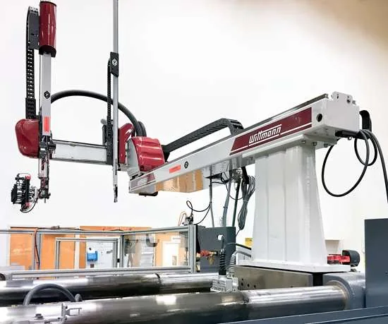 Robotic handling beside moulding equipment in production